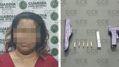 MUJER PORTABA UN ARMA DE FUEGO